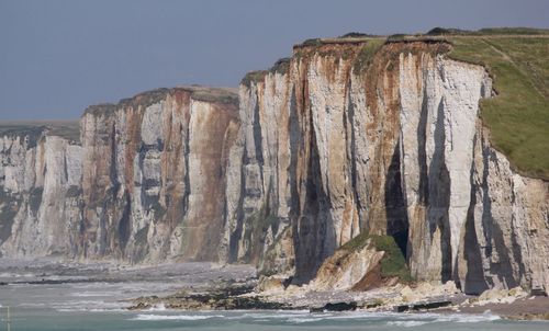 Scenic view of rock formations against sky