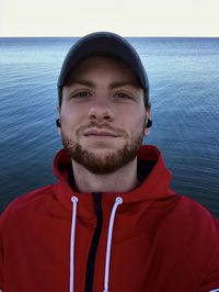 Portrait of young man in sea