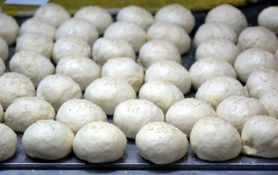 Close-up of onions in container