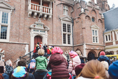 Group of people in front of building