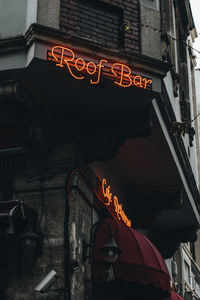 Historic vintage cozy roof bar, cafe with neon red sign in istanbul city