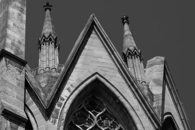 Low angle view of statue against sky