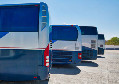 View of truck on road against blue sky