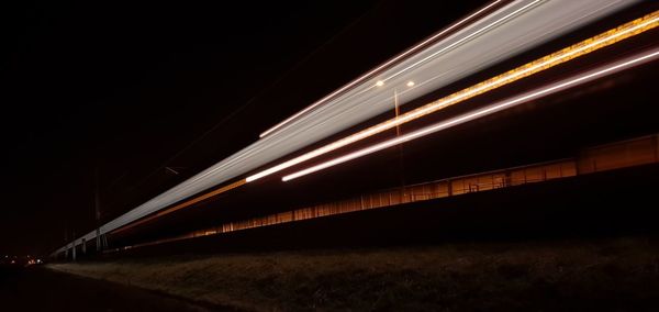 Light trails on bridge at night