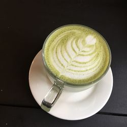 Close-up of coffee cup on table