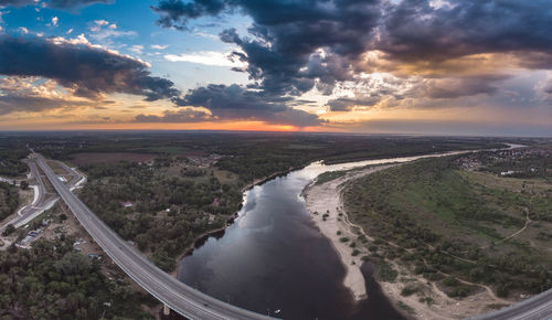 Aerial view of landscape against sky during sunset