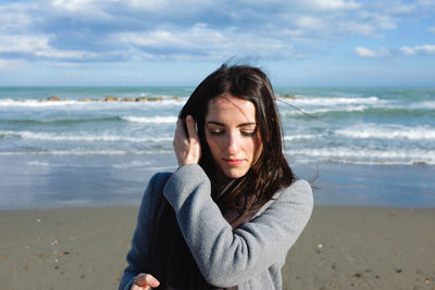 Portrait of beautiful woman at beach