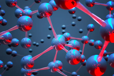 Close-up of molecular structure against blue background