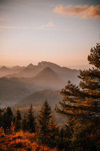 Scenic view of mountains against sky during sunset