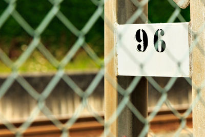 Railway signal behind a fence. horizontal image.