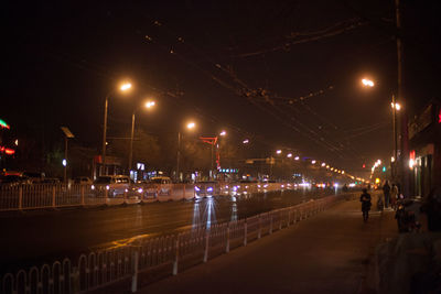 Illuminated street light at night