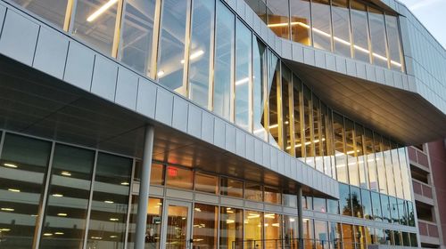 Low angle view of modern building at night