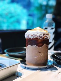 Close-up of coffee cup on table