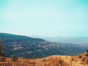 Scenic view of mountains against clear sky