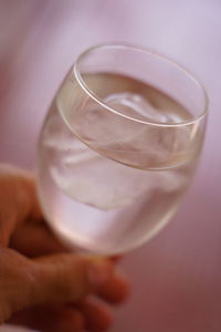 Close-up of hand holding drink