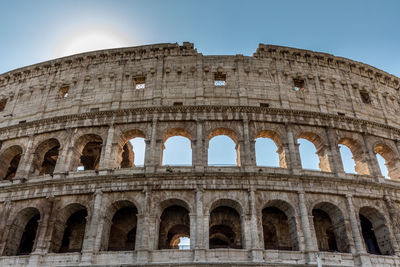 Low angle view of colosseum against clear sky