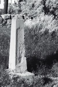 Close-up of statue in cemetery