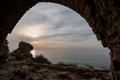 Scenic view of sea against sky during sunset