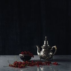 Tea light candles on black background