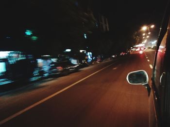 Cars on road at night