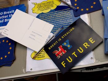 High angle view of information sign on table