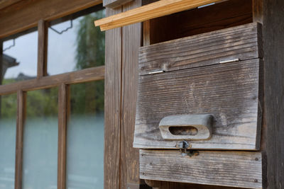 Close-up of open door of house