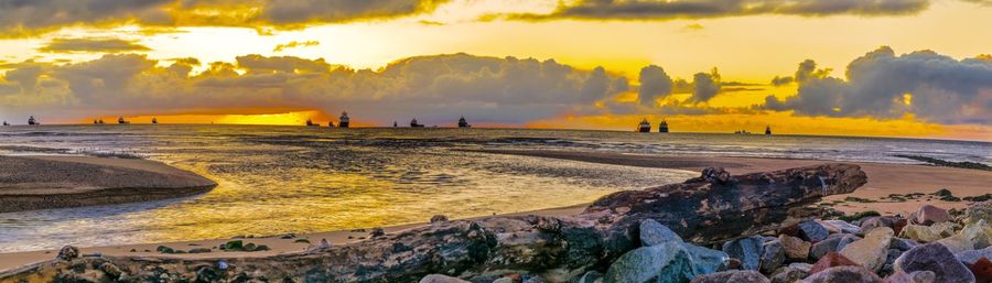 Scenic view of sea at sunset