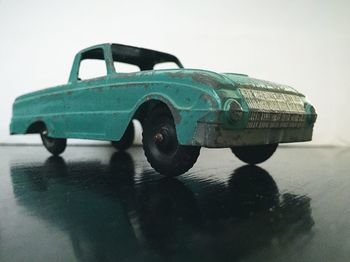 Close-up of toy car against white background