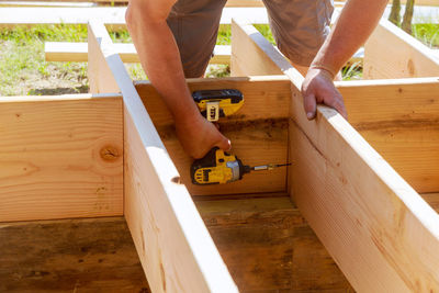 Man working on wood