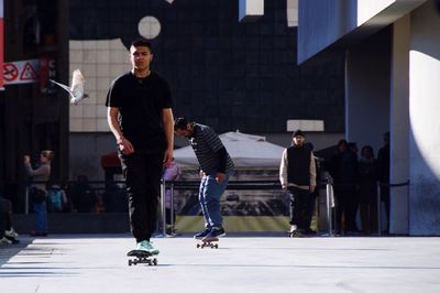 People on skateboard in city