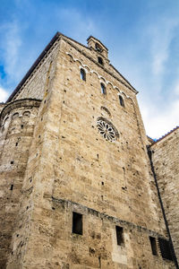 Low angle view of old building against sky