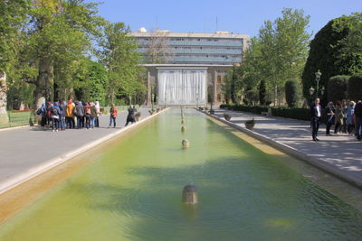 Group of people in front of historical building