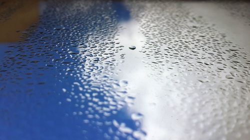 Close-up of water drops on glass