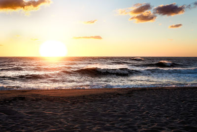 Scenic view of sea against sky during sunset