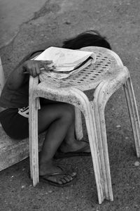 Woman sitting on chair