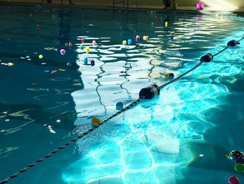 High angle view of swimming in pool