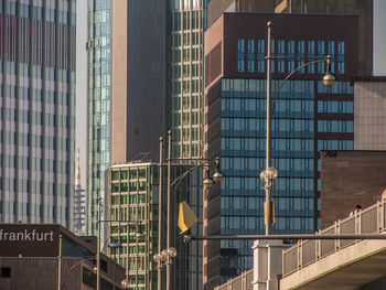 Low angle view of illuminated modern building in city