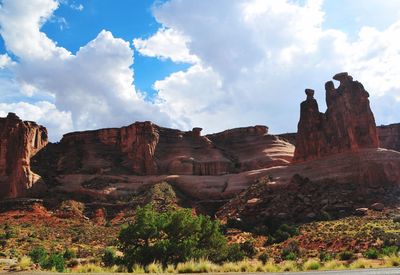 View of rock formations against cloudy sky