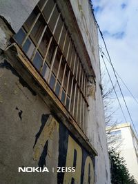 Low angle view of old building against sky