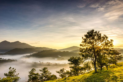 Scenic view of mountains against sky during sunset