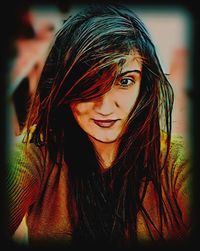 Close-up portrait of a smiling young woman