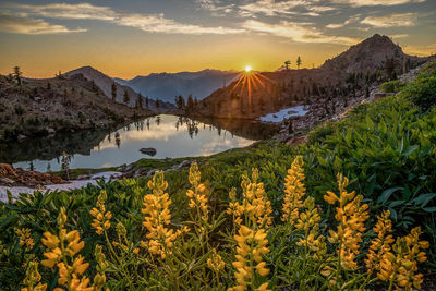 Scenic view of mountains against sky during sunset