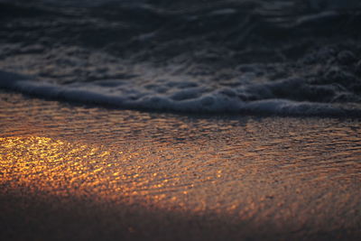 Close-up of sand at beach