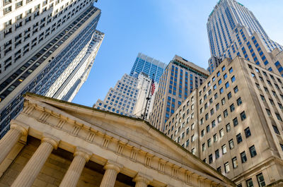 Low angle view of modern buildings against sky