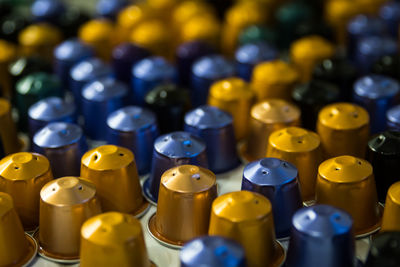 Full frame shot of yellow bottles