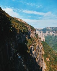 Scenic view of rocky mountains against sky