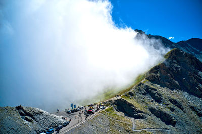 Scenic view of clouds over mountains 