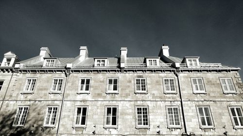 Low angle view of residential building against sky