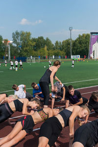 People sitting on field