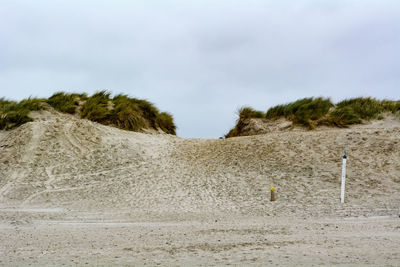 Scenic view of desert against sky